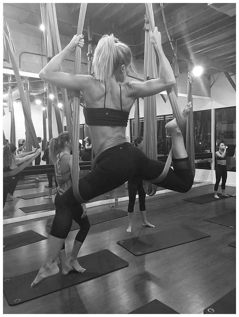 arieal yoga workout with jana williams wearing lanston workout gear 